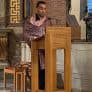 Akbar Abdul Rasul giving a talk in a church setting
